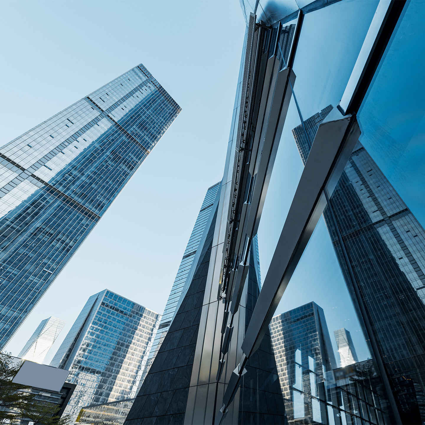 Tall skyscrapers in clear sunny day.